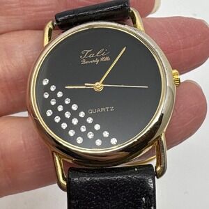 1980s Tali Beverly Hills Watch‎ Rhinestone Accent Gold Tone Black Face Quartz